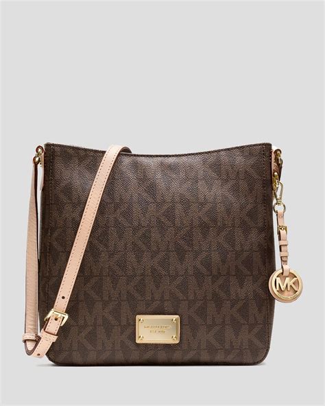 michael kors jet set travel large brown logo crossbody handbag|michael kors jet set item.